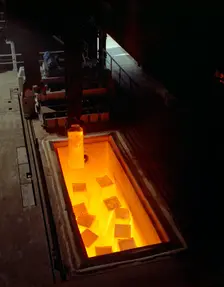 Soaking pits with red hot steel ingots, Sheffield, South Yorkshire, 1965. Creator: Michael Walters
