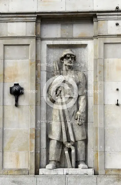 Socialist relief, Constitution Square, Warsaw, Poland. Creator: LTL.