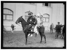 Society Circus - clowns on horseback, between 1909 and 1923. Creator: Harris & Ewing