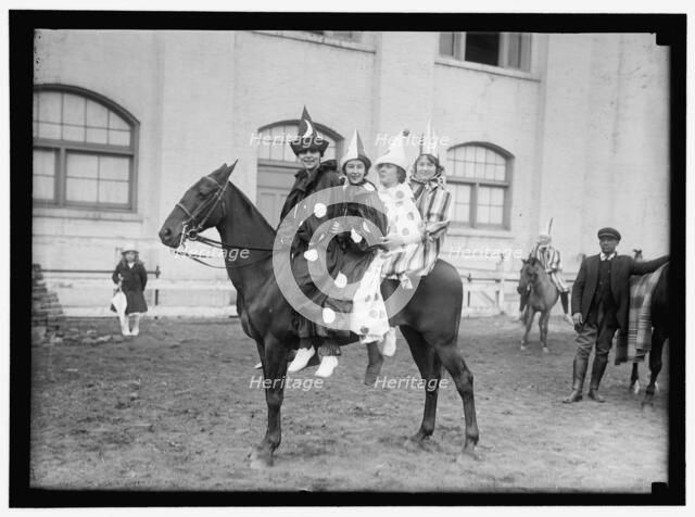 Society Circus - clowns on horseback, between 1909 and 1923. Creator: Harris & Ewing.