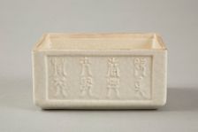 Soft paste rectangular vessel with characters in relief, early 19th century. Creator: Unknown