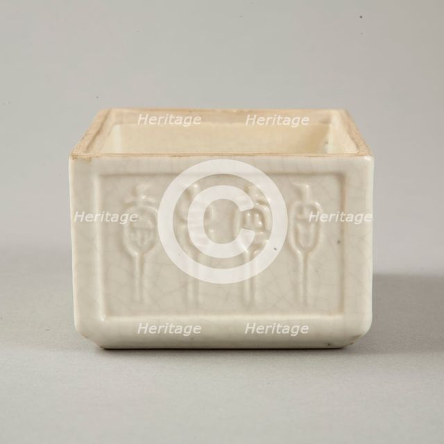 Soft paste rectangular vessel with characters in relief, early 19th century. Creator: Unknown.
