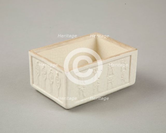 Soft paste rectangular vessel with characters in relief, early 19th century. Creator: Unknown.