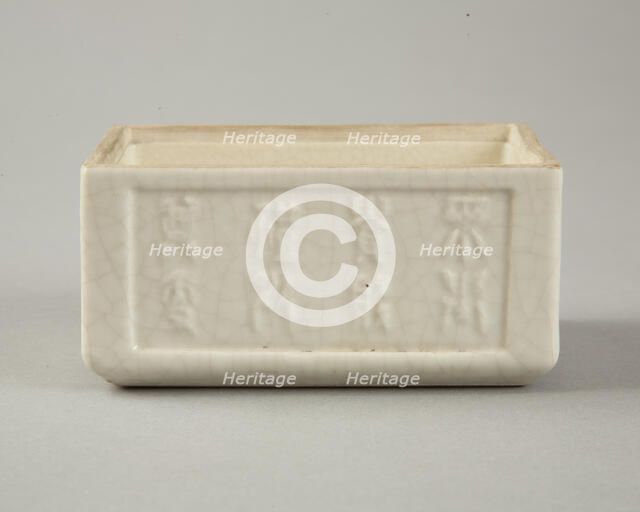 Soft paste rectangular vessel with characters in relief, early 19th century. Artist: Unknown.