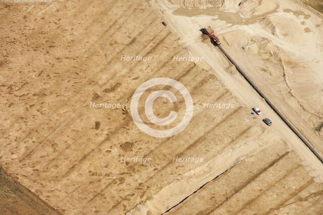 Soilmark of a possible Bronze Age round barrow, near Siddington, Gloucestershire, 2015. Creator: Historic England.