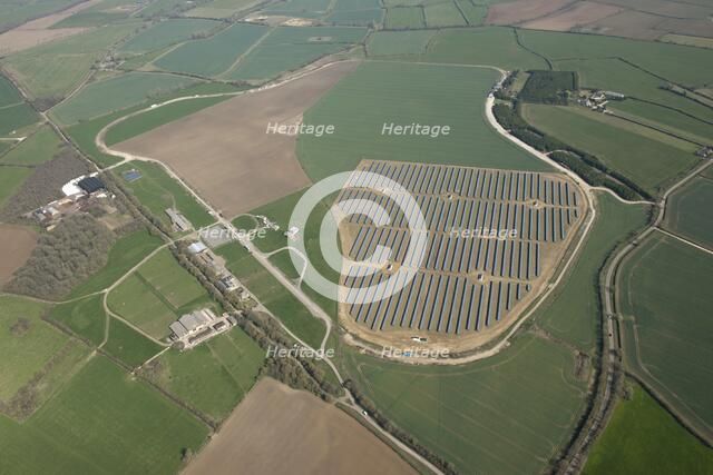 Solar farm on the site of the former RAF airfield, Long Newnton, Gloucestershire, c2010s(?). Artist: Damian Grady.