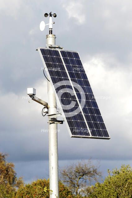Solar Panel powering roadside equipment. Artist: Unknown.