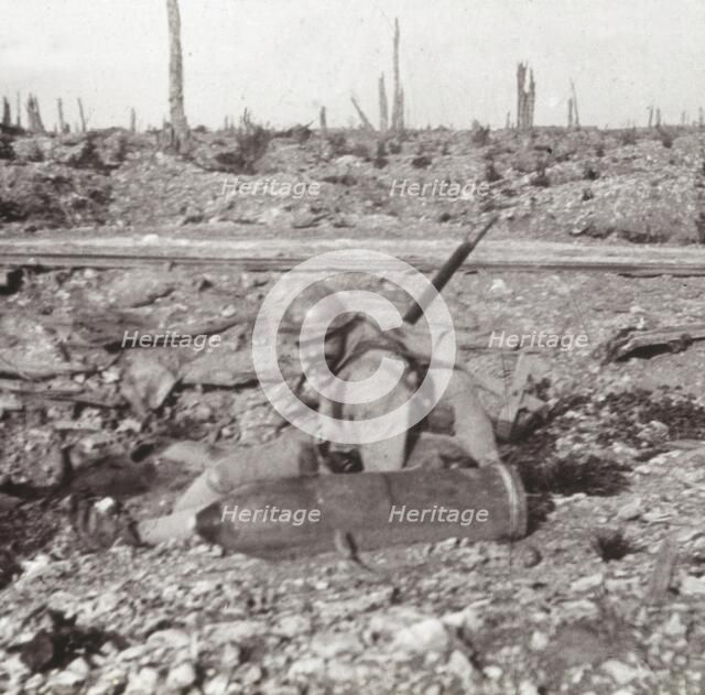 Soldier with shell, Bois d'Avocourt, Verdun, northern France, c1914-c1918. Artist: Unknown.