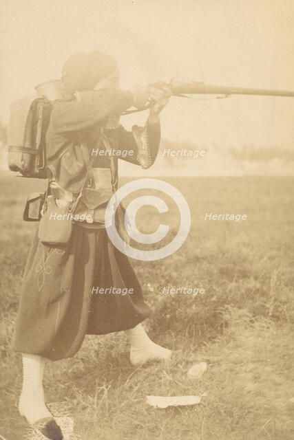 [Soldier Aiming Rifle], 1880s-90s. Creator: Unknown.