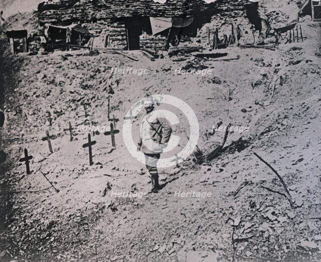 Soldier among wooden crosses, c1914-c1918. Artist: Unknown.