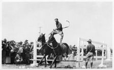 Soldier performing equestrian acrobatics, Fort Sheridan, Illinois, USA, 1940