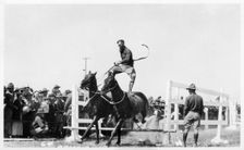 Soldier performing equestrian acrobatics, Fort Sheridan, Illinois, USA, 1940