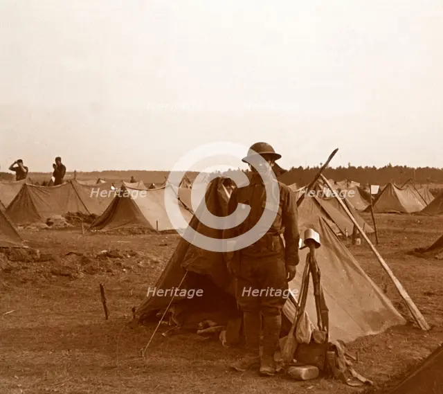 Soldier standing by tent, American camp, Melette, France, c1914-c1918.  Artist: Unknown.