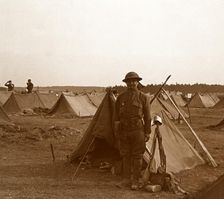 Soldier standing by tent, American camp, Melette, France, c1914-c1918