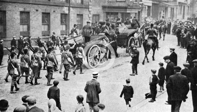 Soldiers convoying coal carts during the strike, Sheffield, c1920. Artist: Unknown
