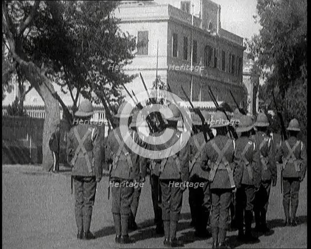 Soldiers Carrying Rifles Patrolling Outside the Egyptian Palace After the Assassination of..., 1924. Creator: British Pathe Ltd.