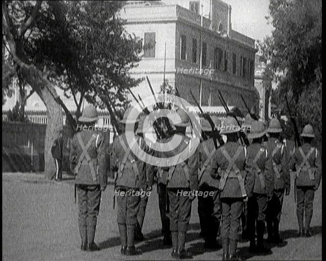 Soldiers Carrying Rifles Patrolling Outside the Egyptian Palace After the Assassination of..., 1924. Creator: British Pathe Ltd.