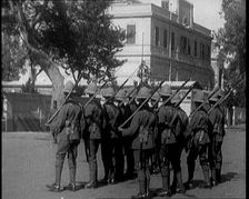 Soldiers Carrying Rifles Patrolling Outside the Egyptian Palace After the Assassination of ..., 1924 Creator: British Pathe Ltd