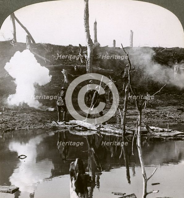 Soldiers crossing the river Ancre, Battle of the Somme, France, World War I, 1916.Artist: Realistic Travels Publishers