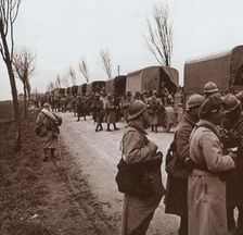 Soldiers and column of trucks on the Voie Sacrée, Verdun, northern France, c1914-c1918