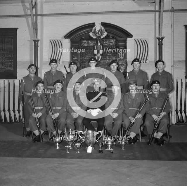 Soldiers and their officer in front of the Honourable Artillery Company's War Memorial, c1945-c1965. Artist: SW Rawlings