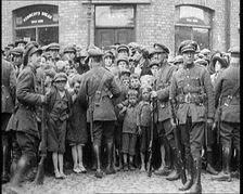 Soldiers Holding Back Children in Dublin, 1922. Creator: British Pathe Ltd