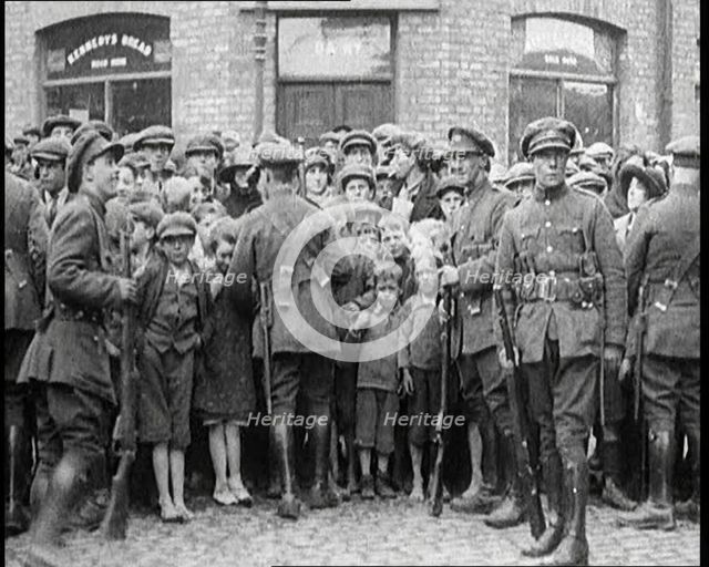 Soldiers Holding Back Children in Dublin, 1922. Creator: British Pathe Ltd.
