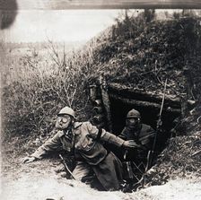 Soldiers in gas masks emerging from trenches, c1914-c1918