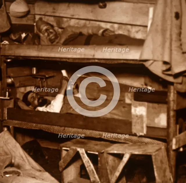 Soldiers in wooden bunks, c1914-c1918. Artist: Unknown.