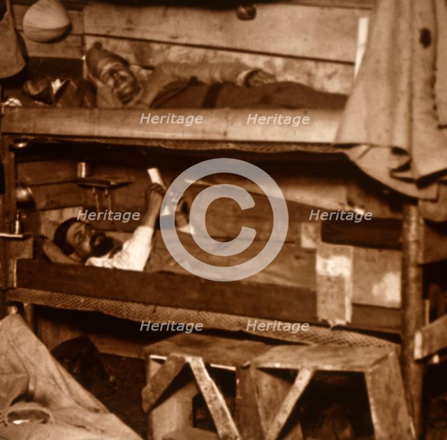 Soldiers in wooden bunks, c1914-c1918. Artist: Unknown.