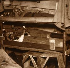 Soldiers in wooden bunks, c1914-c1918