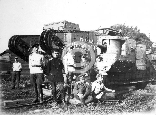 Soldiers of the Volunteer Army before the tank 'General Drozdovsky, 1919.  Artist: Anon