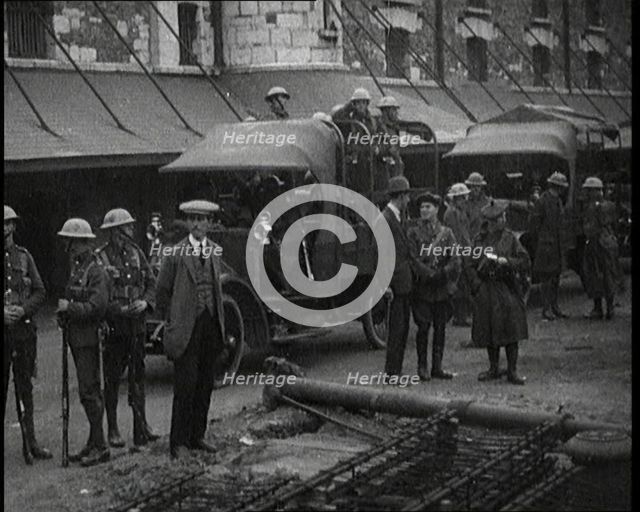 Soldiers Standing Guard as the Body of Terence MacSwiney Is Returned to Cork Harbour, 1920. Creator: British Pathe Ltd.