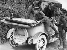 Soldiers performing a spot check on a car, c1910s(?)