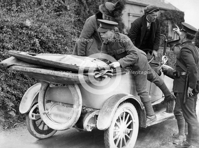 Soldiers performing a spot check on a car, c1910s(?). Creator: Unknown.