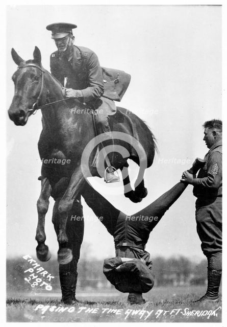 Soldiers performing equestrian stunts, Fort Sheridan, Illinois, USA, 1920. Artist: Unknown