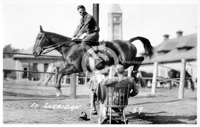 Soldiers performing equestrian stunts, Fort Sheridan, Illinois, USA, 1920. Artist: Unknown