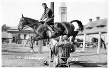Soldiers performing equestrian stunts, Fort Sheridan, Illinois, USA, 1920