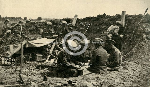 Soldiers playing cards in the trenches, First World War, c1916, (c1920).  Creator: Unknown.