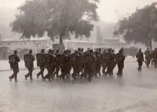 Soldiers returning to their base in a cloudburst, Stockholm, Sweden, 1934. Creator: Karl Sandels