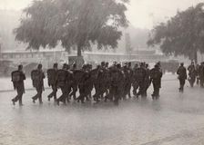 Soldiers returning to their base in a cloudburst, Stockholm, Sweden, 1934. Artist: Karl Sandels