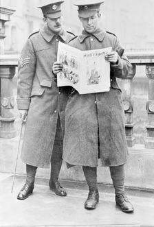 Soldiers reading the Suffragette newspaper, April 1915. Creator: Unknown