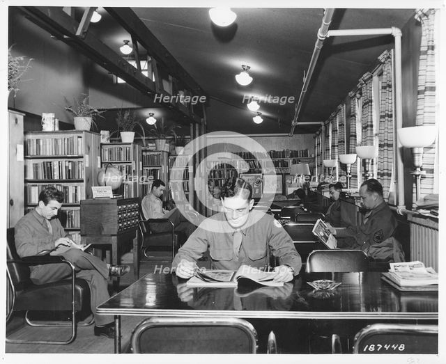 Soldiers reading in the library in Service Club No 1, Fort Sheridan, Illinois, USA, 1943. Artist: Unknown