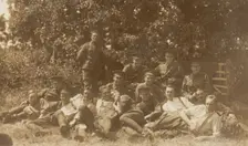 Soldiers relaxing in a field, (between 1910 and 1919?). Creator: Unknown