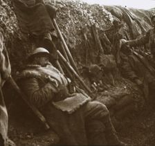 Soldiers resting in trenches, c1914-c1918