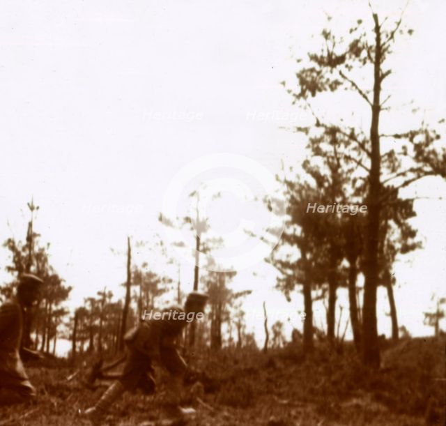 Soldiers running on the battlefield, c1914-c1918. Artist: Unknown.