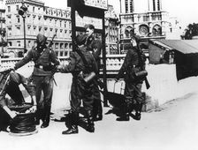 Soldiers with a telephone cable on the Pont St Michel, Paris, June 1940