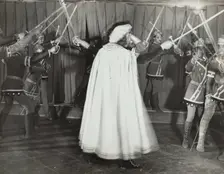 Soldiers with swords raised, 1936. Creator: Eagle Ezzes & Mipaas