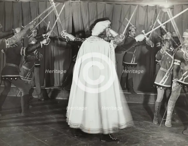 Soldiers with swords raised, 1936. Creator: Eagle Ezzes & Mipaas.