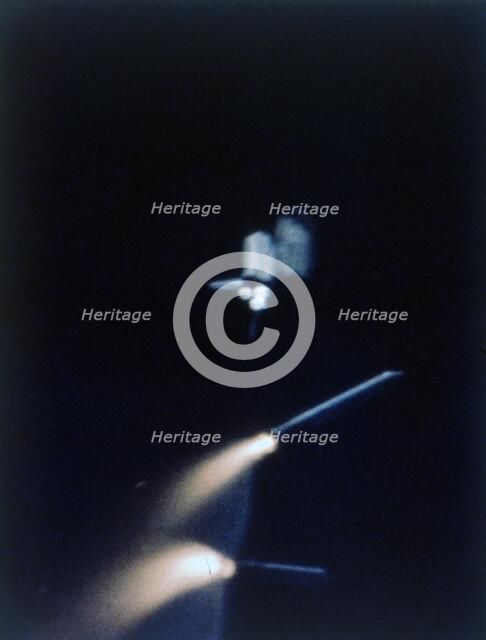 Solid rocket booster separates, first Space Shuttle flight, 12 April 1981. Creator: NASA.